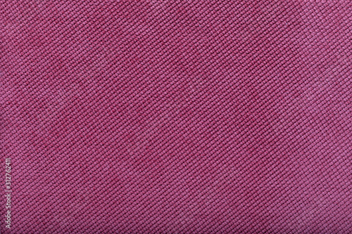 close-up of pink fabric surface, small stitches as background