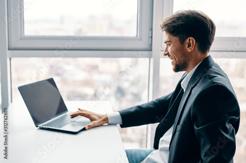 businessman working on laptop in office