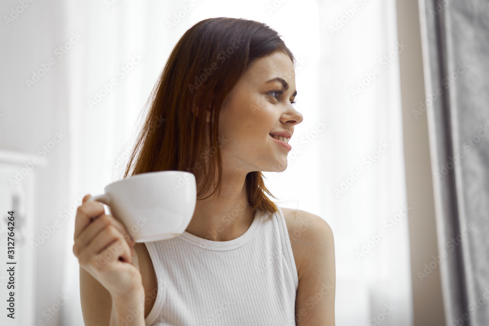 young woman with cup of coffee young woman with cup of coffee