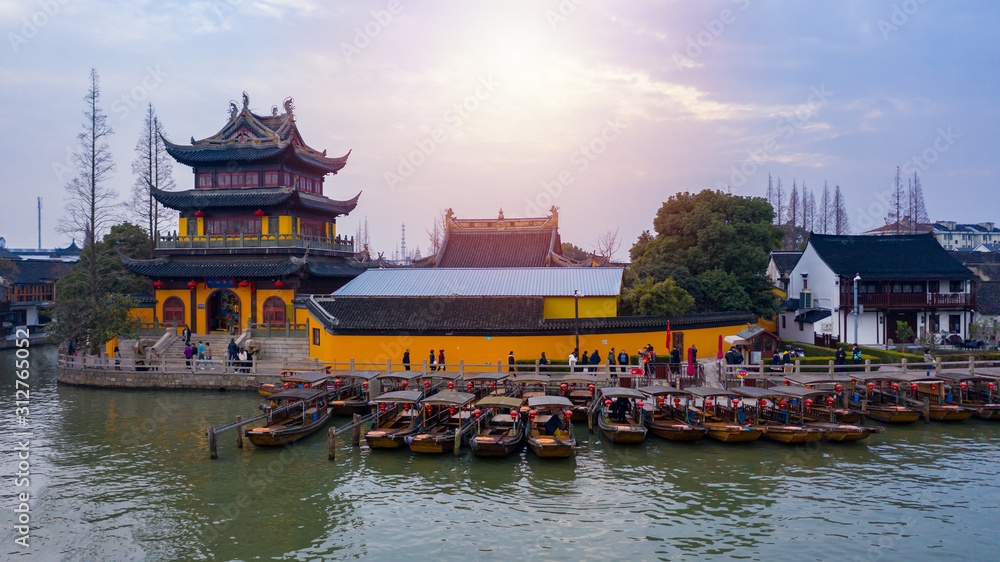 Obraz premium Aerial view Zhujiajiao Water Town and China traditional tourist boats on canals of Shanghai Zhujiajiao Water Town in Shanghai, China.