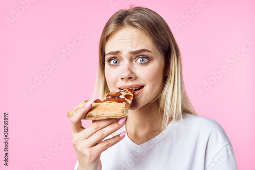 young woman eating cake