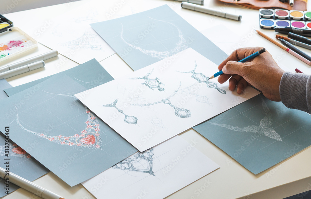 Designer design diamond jewelry drawing sketches making works craft unique handmade luxury necklaces product ideas. Designer design diamond jewelry drawing sketches making works craft unique handmade luxury necklaces product ideas.