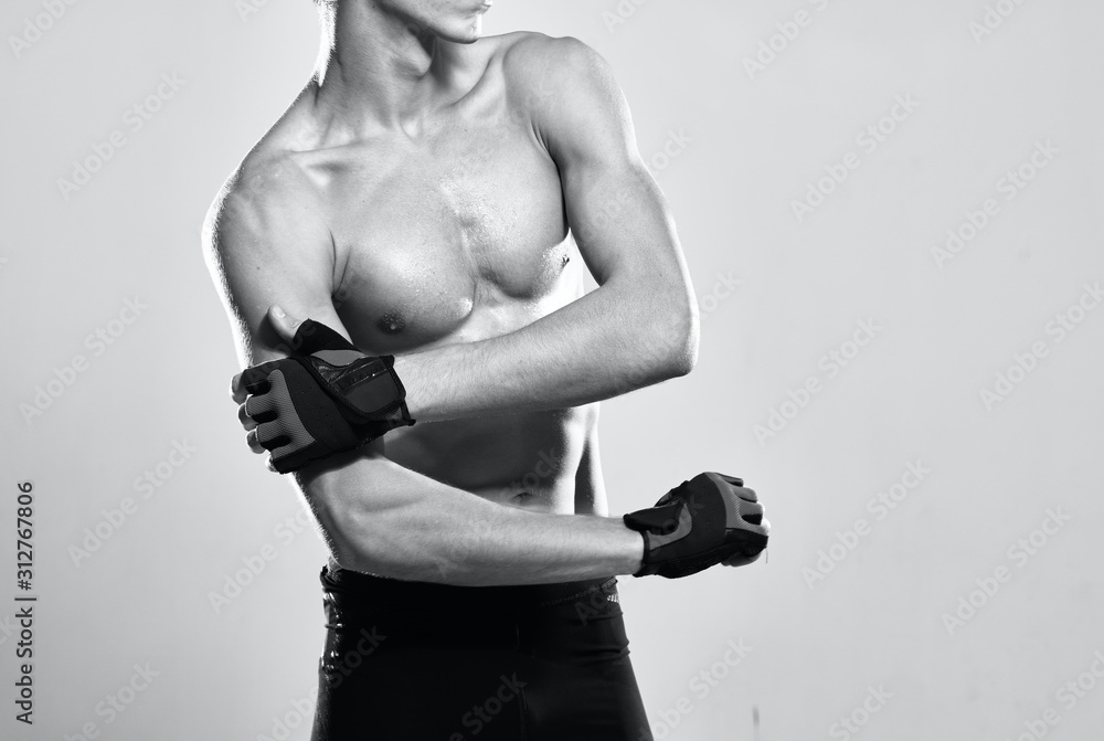 Naklejka premium muscular man lifting weights