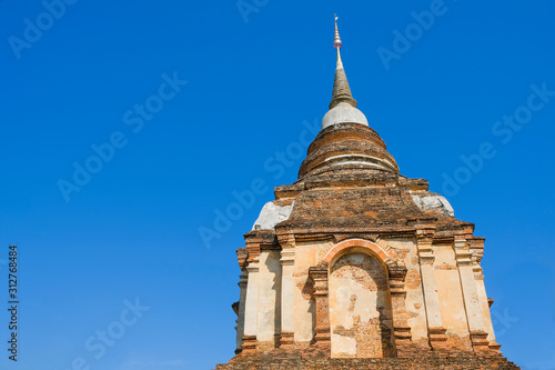 The remains of the ancient pagoda and the bright blue sky.