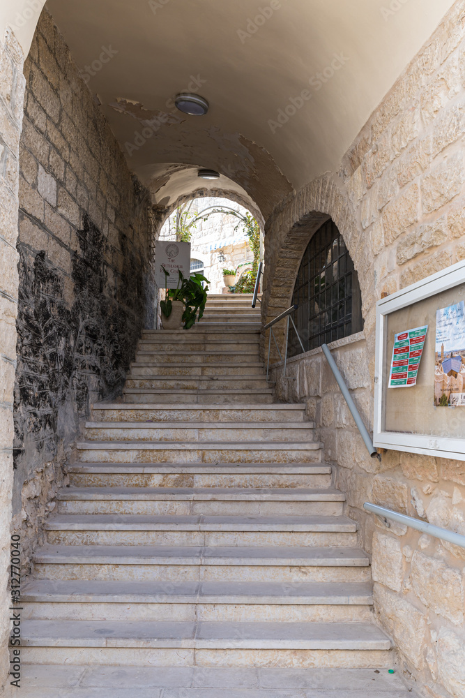 Narrow street with steps leading up in Bethlehem in Palestine
