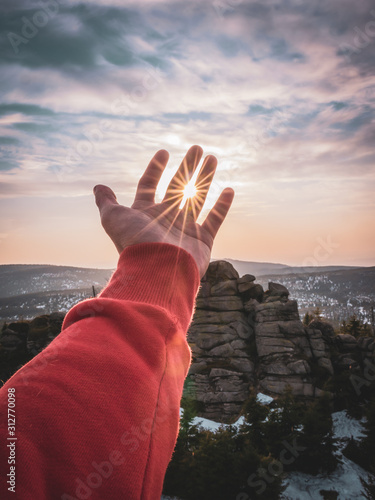 Sun in a hand