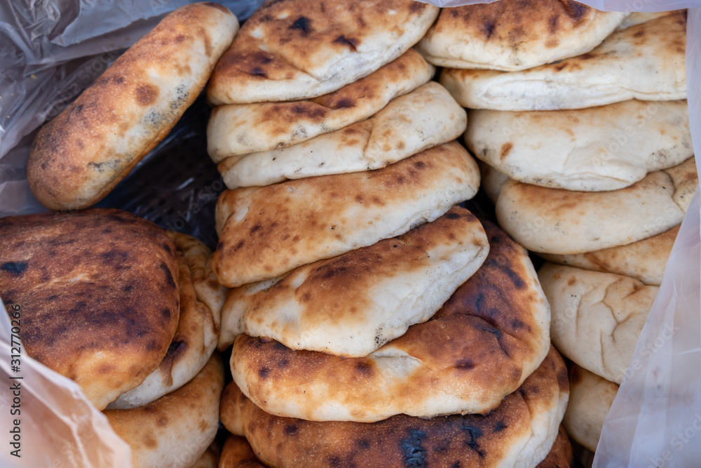Fresh traditional Iraqi flat bread sold at the local farmers market