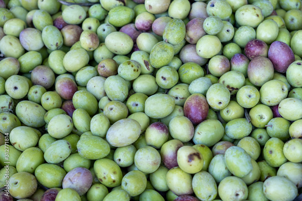 The new harvest green olives sold on farmers market The new harvest green olives sold on farmers market