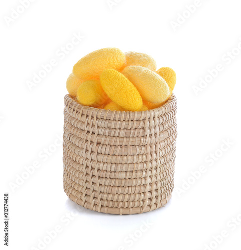 yellow cocoons in basket on white background.