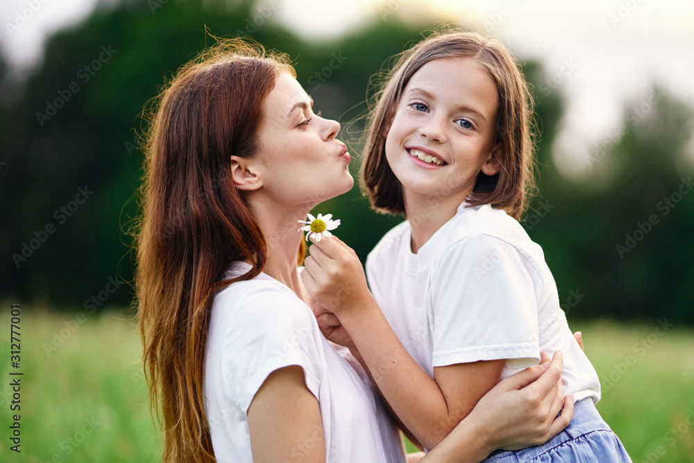 mother and daughter in the park mother and daughter in the park