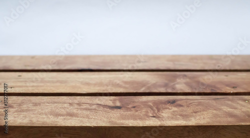Wood table with white blurry background