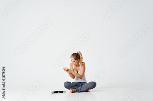 woman sitting on the floor with laptop