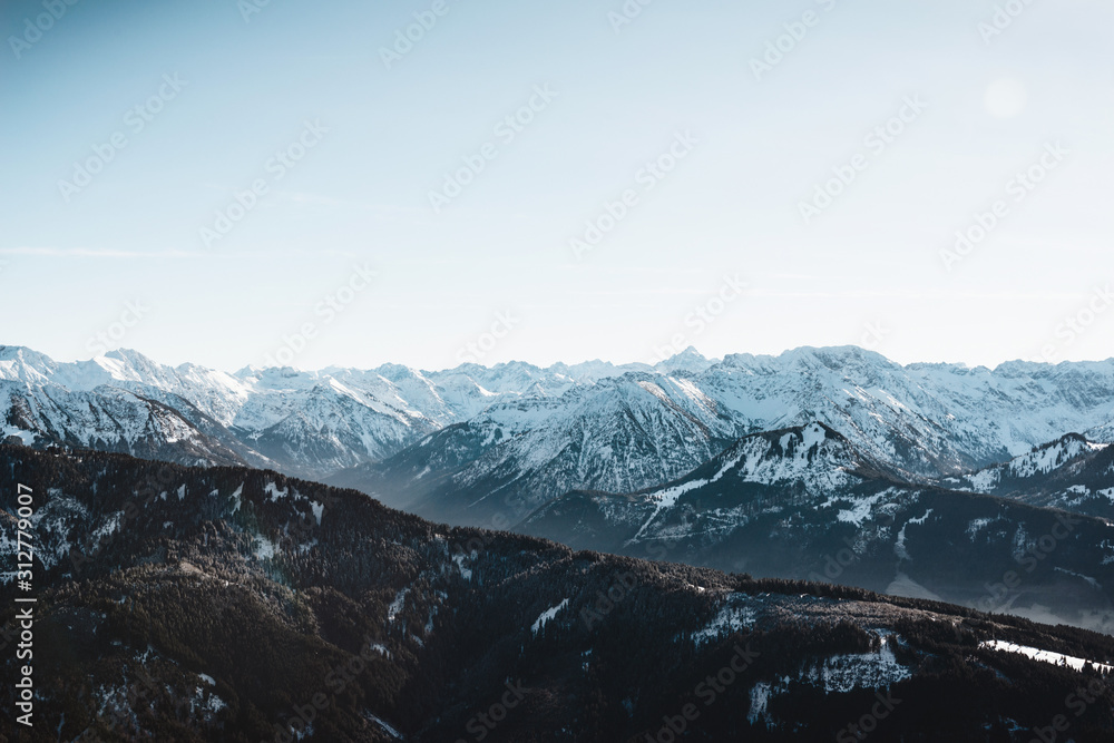 Winter moody mountain landscape with snow covered peaks. Bavarian mountains in the Allgaeu area near Oberstdorf, Germany