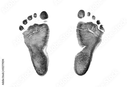 Baby footprints on transparent paper. Black footprint isolated on white background. 