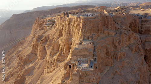 Photos Drone View of Masada National Park at sunrise, Dead sea, Israel Masada - Aerial