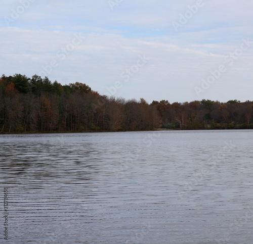 A landslide view of the lake on a cloudy autumn day.
