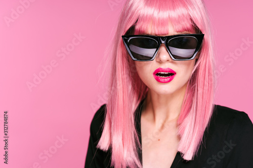 portrait of young woman in sunglasses