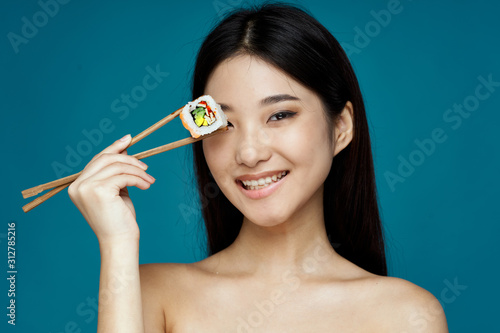 young woman with makeup brush