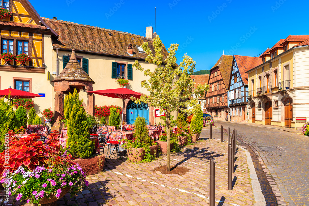 Restaurant tables on village square of Kintzheim which is located on famous Alsace wine route, France