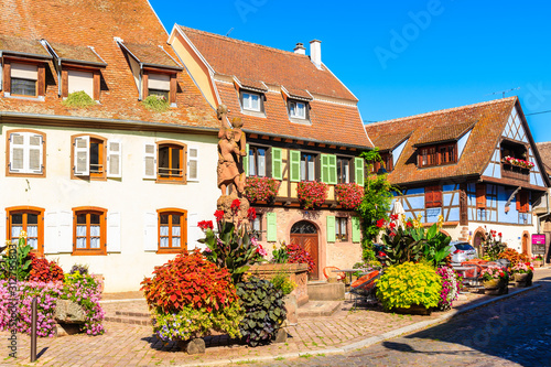KINTZHEIM VILLAGE  FRANCE - SEP 19  2019  Colorful houses decorated with flowers on street in beautiful old village of Kintzheim which is located on famous Alsace wine route  France.
