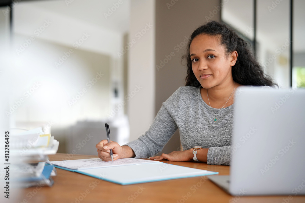 metis woman working in office