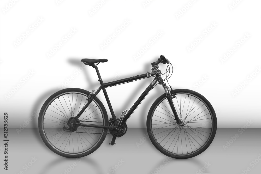 Black bicycle on sparse monochrome background Black bicycle on sparse monochrome background
