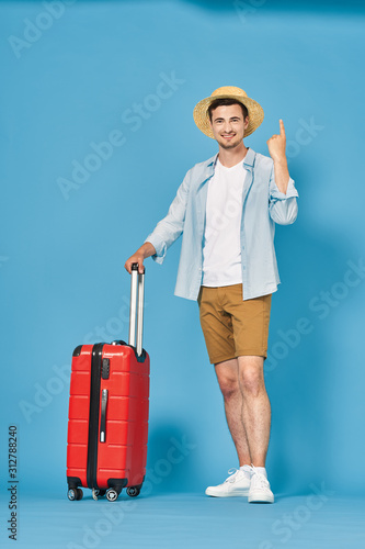 young woman with suitcase