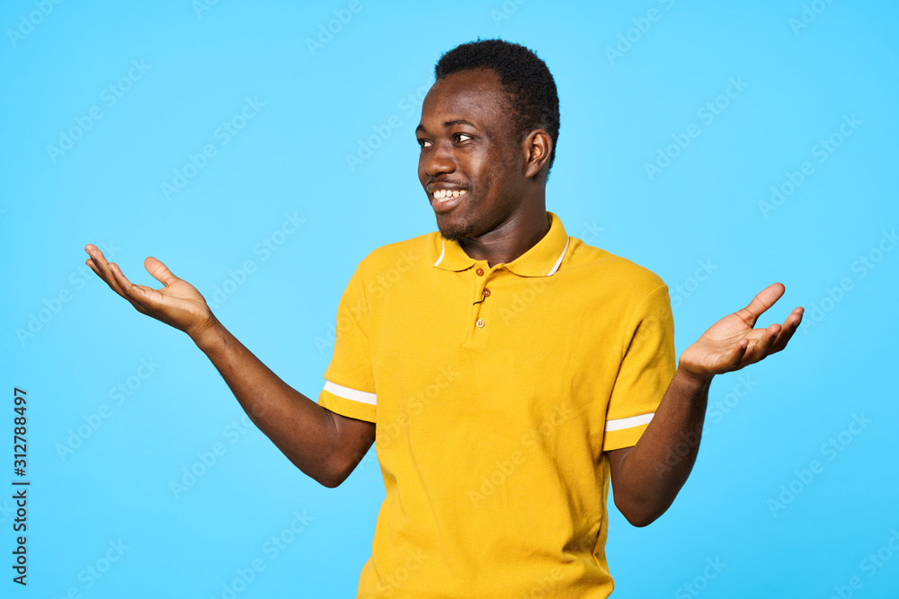 young man with arms raised young man with arms raised