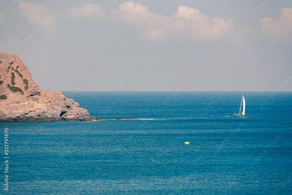 View on the seaside landscape Milos island at Paliochori beach at summer sun