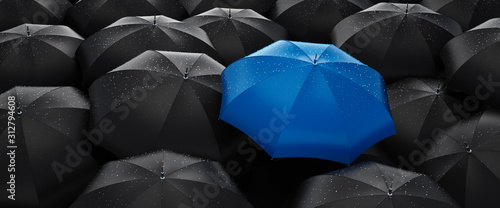 umbrella stand out from the crowd of many black umbrellas - being different concept photo