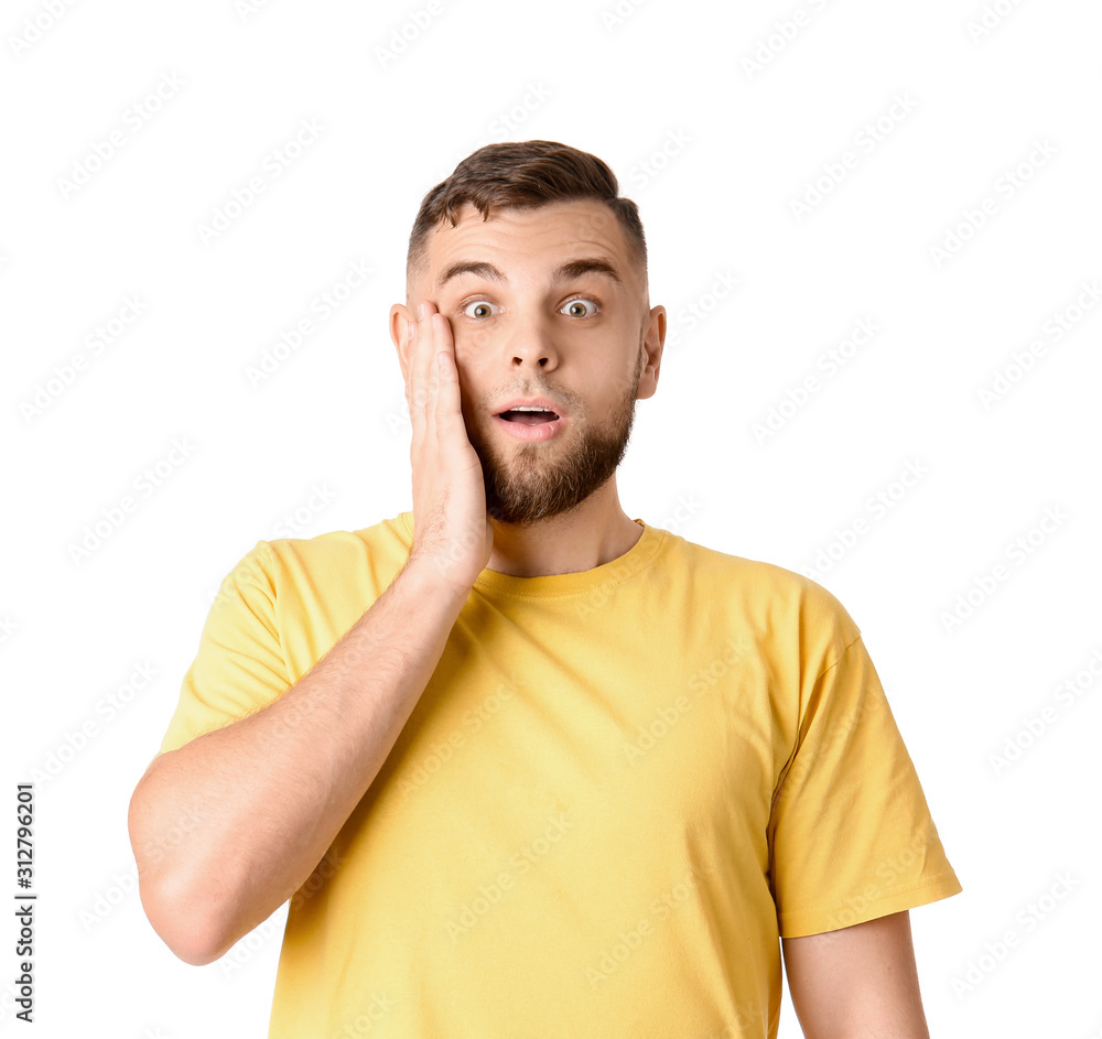 Surprised young man on white background Surprised young man on white background