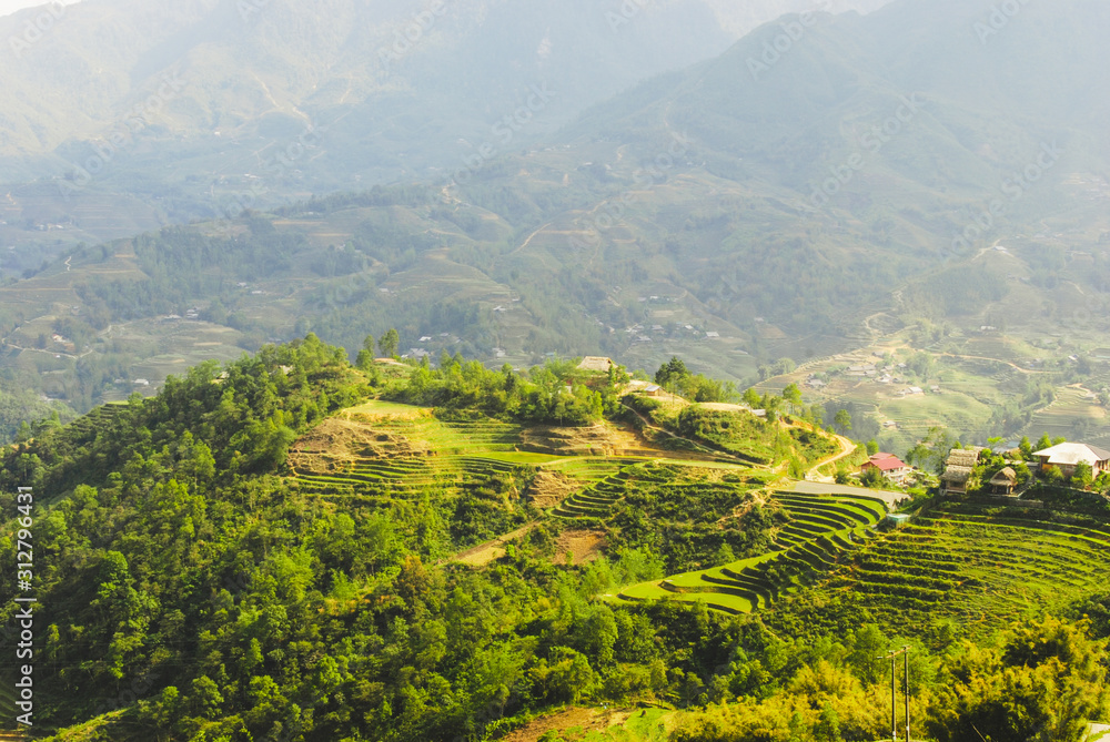 Fototapeta premium Scenery of Y Linh Ho valley with rice terraces surrounded with mountains by Sapa, Vietnam 
