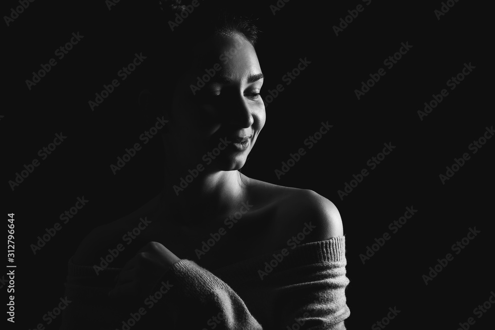 Silhouette of beautiful young woman on dark background Silhouette of beautiful young woman on dark background