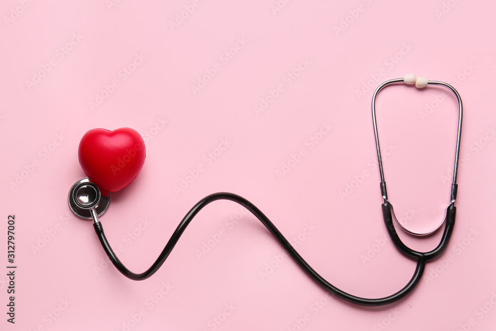 Stethoscope and heart on color background Stethoscope and heart on color background