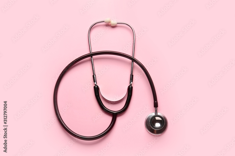 Modern stethoscope on color background Modern stethoscope on color background