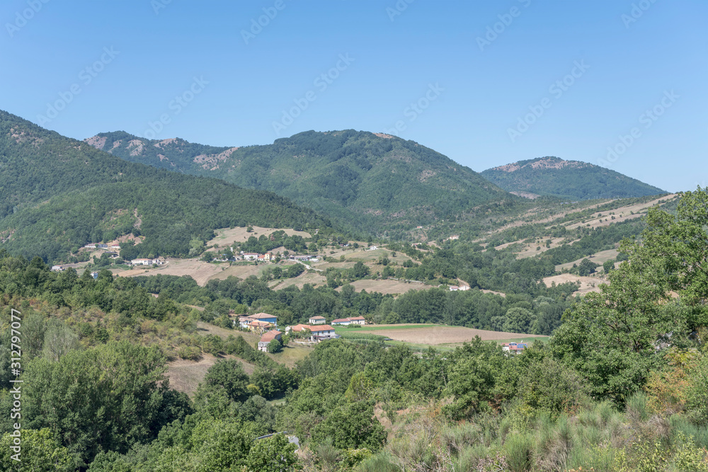 farms in green landscape of Southern Apennnines near Moliterno, Italy