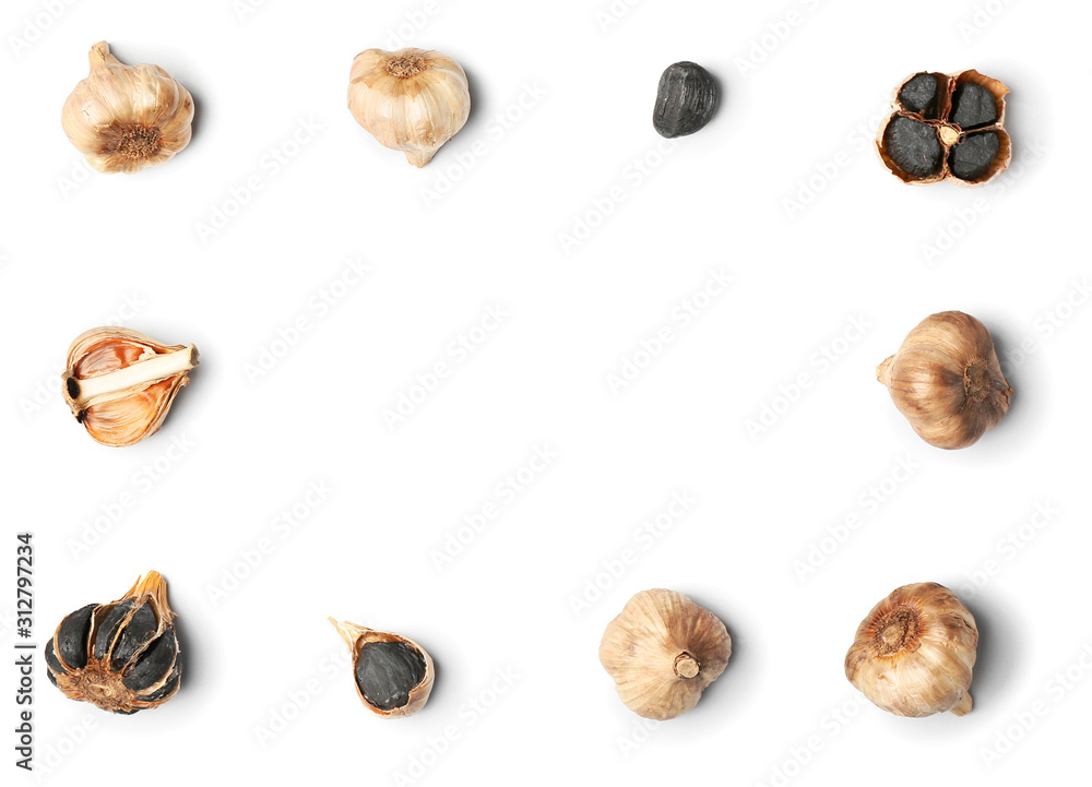 Frame made of black garlic on white background Frame made of black garlic on white background