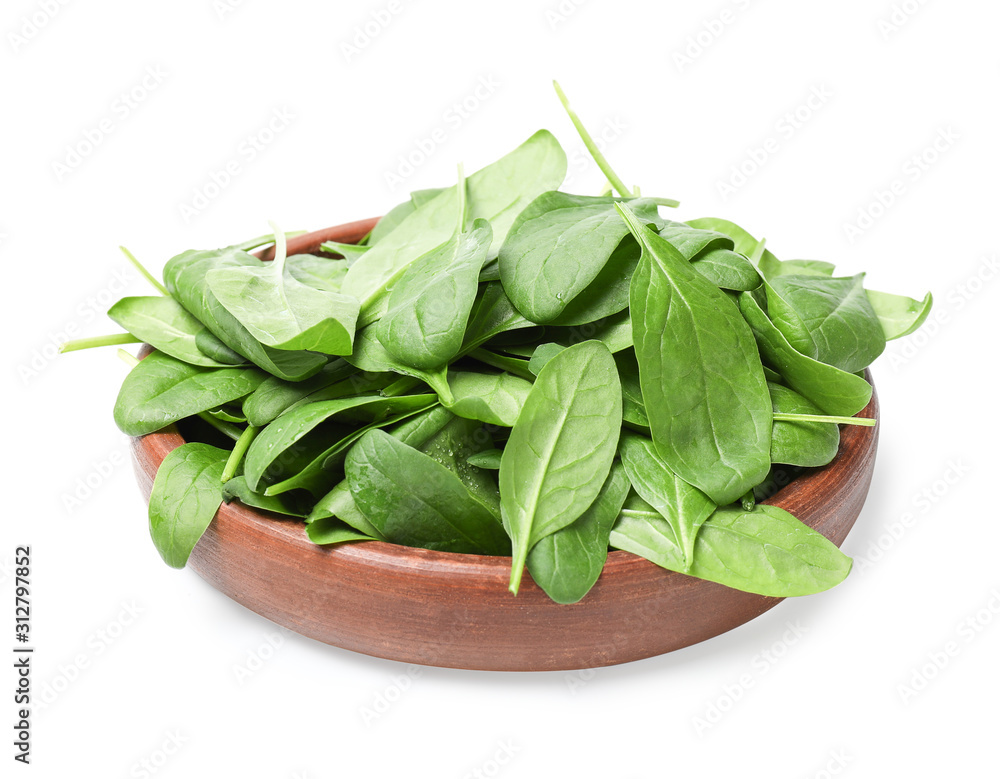 Plate with fresh spinach on white background Plate with fresh spinach on white background