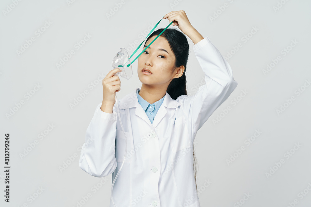 portrait of a young woman looking at the camera portrait of a young woman looking at the camera