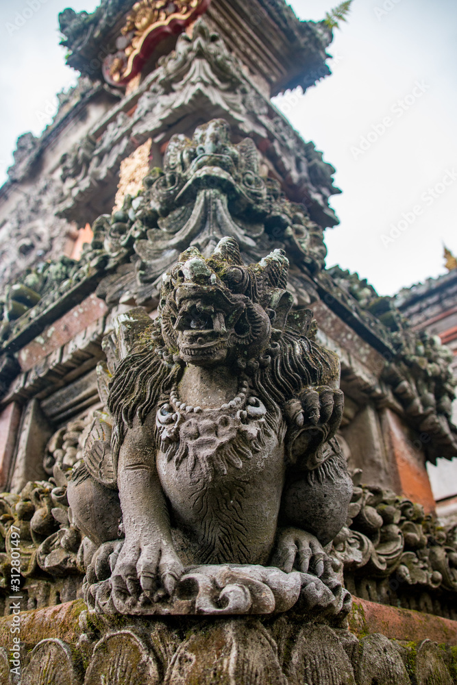 Dragon Stone Carvings In A Traditional Balinese Temple, Saraswati Water Temple, In Ubud, Bali, Indonesia