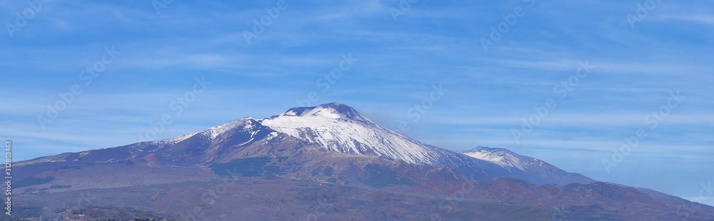 Etna volcano covered in snow. View from afar. Italy Etna volcano covered in snow. View from afar. Italy