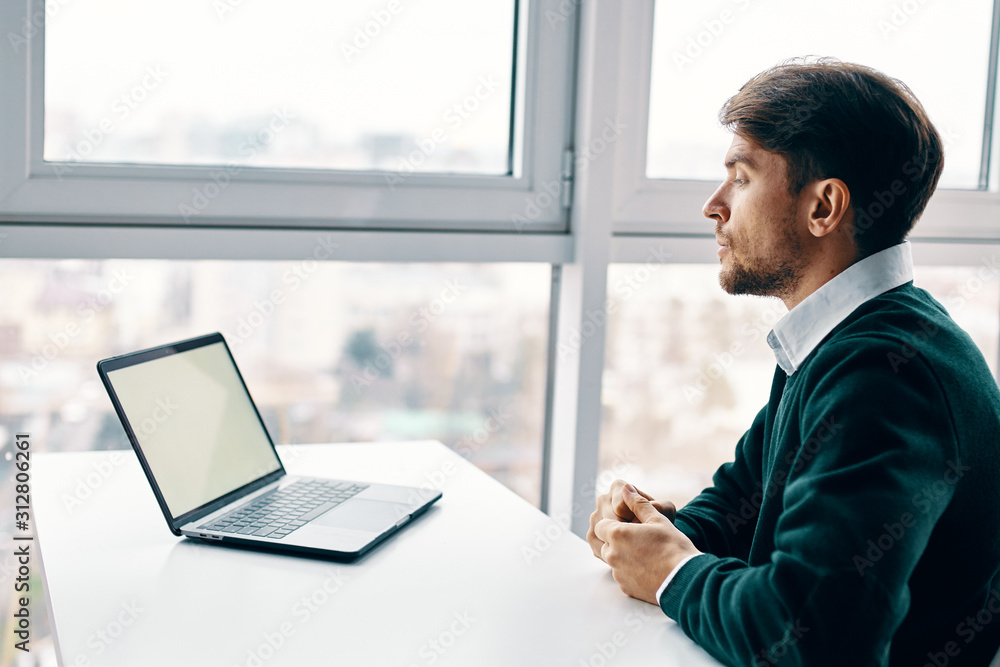 businessman working on laptop in office businessman working on laptop in office