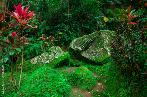 Goa Gajah Hidden Lush Green Forest With Caves, Secret Waterfalls and Ancient Carvings In Bali, Indonesia © DearTravallure