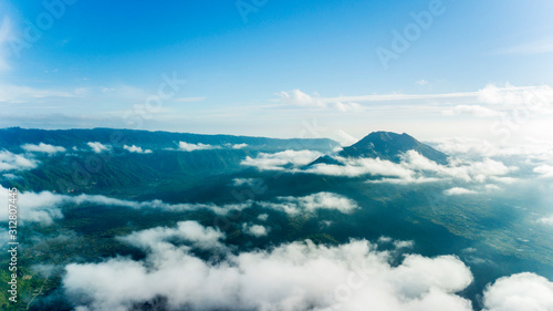 Aerial view of mountain ridge full of cloud mist