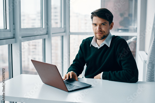 businessman working on laptop in office