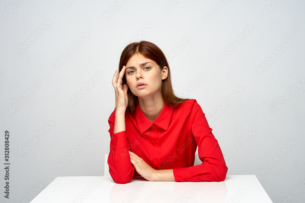 portrait of young woman sitting on the floor portrait of young woman sitting on the floor