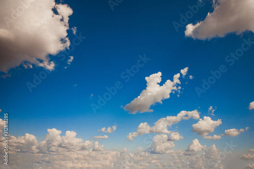 Amazing summer blue sky with frash clouds photo