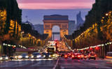 Champs Elysees and Arc de Triomphe in Paris France. night scene with car traffic