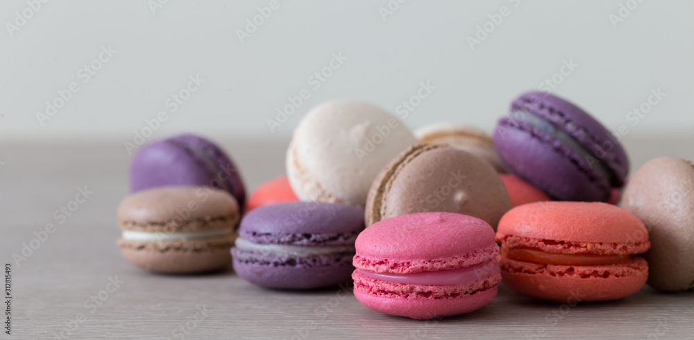 Food. macaroons сolorful, beige background Food. macaroons сolorful, beige background