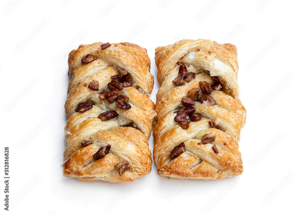 Flaky pastry filled with maple syrup and topped with pecan isolated on white
